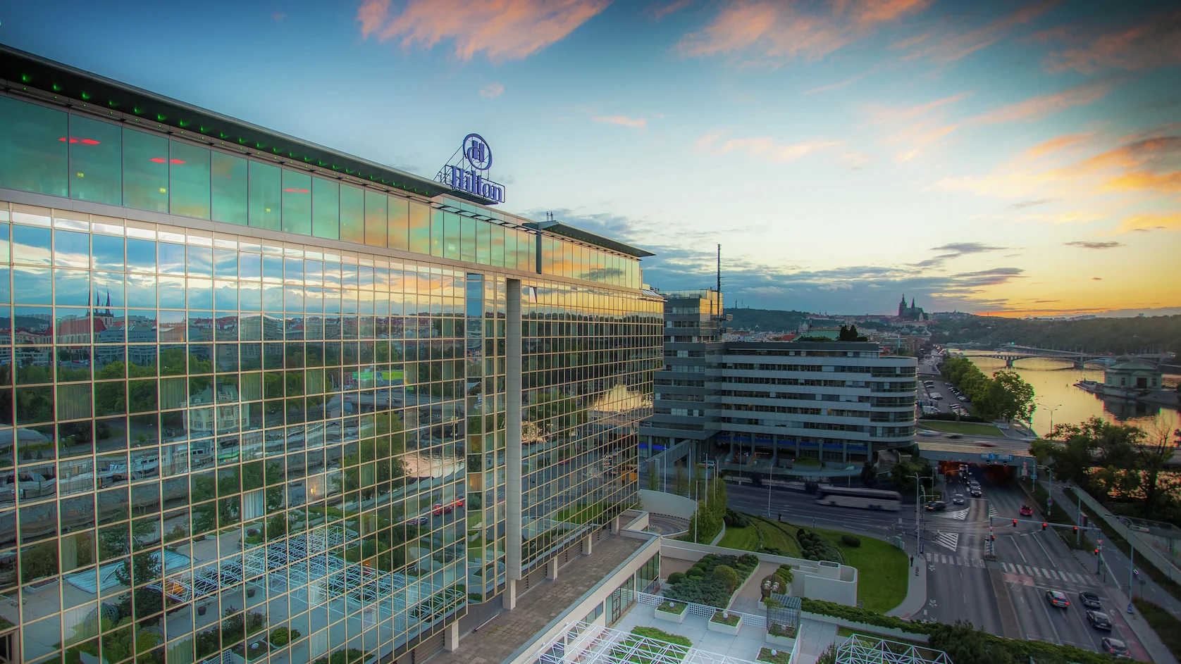 Hilton Prague Atrium exterior with Prague skyline